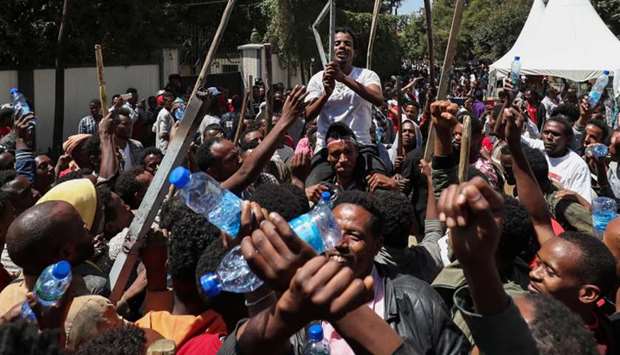 Oromo youth chant slogans during a protest in-front of Jawar Mohammedu2019s house, an Oromo activist and leader of the Oromo protest in Addis Ababa, Ethiopia, on Thursday