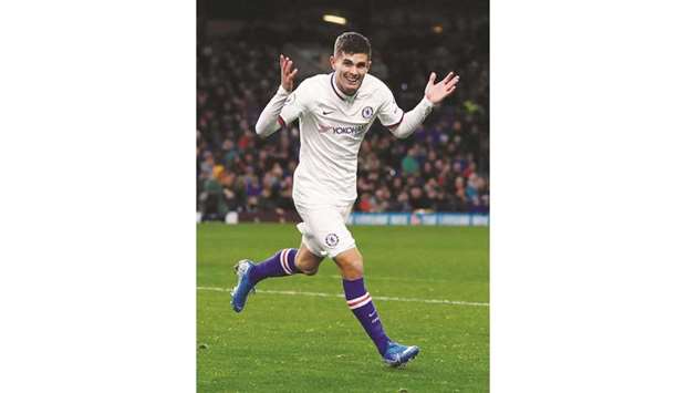 Chelseau2019s Christian Pulisic celebrates scoring their third goal to  complete his hat-trick yesterday.
