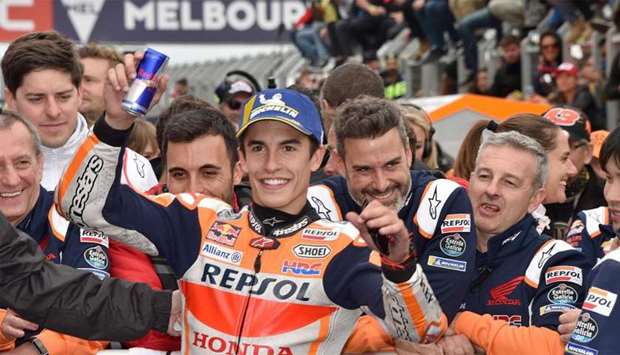 Repsol Honda MotoGP rider Marc Marquez of Spain celebrates winning the Australian Grand Prix motorcycle race at Phillip Island