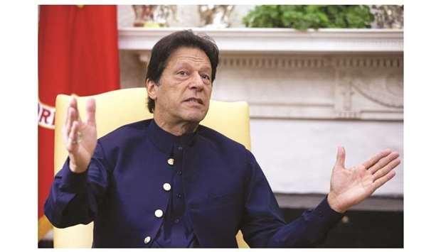 Imran Khan, Pakistanu2019s Prime Minister, speaks during a meeting in the Oval Office of the White House in Washington. Pakistan will need to obtain the International Monetary Fundu2019s permission to float its government securities comprising, eurobonds, sukuk and three-year bonds for exporters.