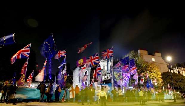 Anti and pro-Brexit protesters demonstrate outside the Houses of Parliament in London