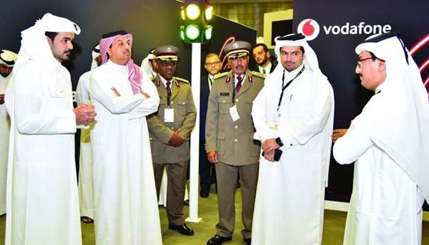 HE the president of Qatar Olympic Committee Sheikh Joaan bin Hamad al-Thani, HE the Deputy Prime Minister and Minister of State for Defence Affairs Dr Khalid bin Mohamed al-Attiyah, and Vodafone Qatar CEO Sheikh Hamad Abdulla Jassim al-Thani at the Vodafone pavilion.