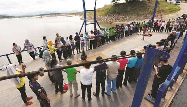 Activists and villagers protest against Laos dam on Mekong river outside of Loei in Thailand.
