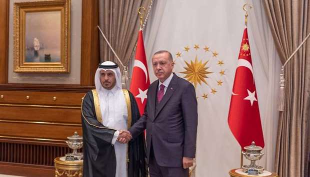 Turkish President Recep Tayyip Erdogan with HE the Prime Minister and Minister of Interior Sheikh Abdullah bin Nasser bin Khalifa al-Thani at the Presidential Palace in Ankara