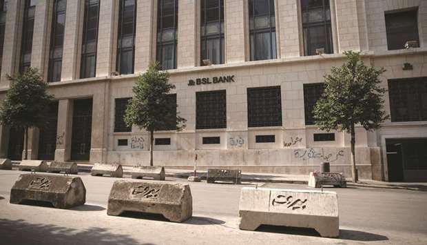 The closed headquarters of BSL Bank stand in downtown Beirut on October 25. Lebanon, one of the worldu2019s most indebted  countries, has seen its credit risk soar as confidence in the governmentu2019s ability to address the economic woes diminishes.