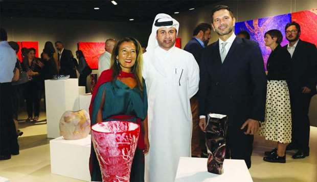 Caterina Varchetta, Dr Khalid bin Ibrahim al-Sulaiti , and Pasquale Salzano at the opening of u2018No Boundariesu2019 exhibition at Katara.