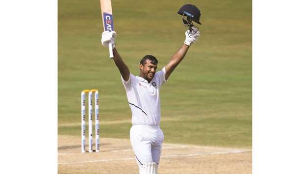 Indian opener Mayank Agarwal celebrates scoring 200 runs during the second dayu2019s play of the first Test against South Africa at the Dr. Y.S. Rajasekhara Reddy ACA-VDCA Cricket Stadium in Visakhapatnam yesterday. (AFP)