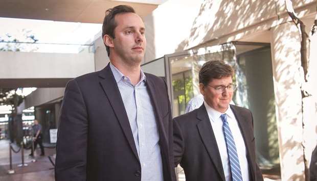 Anthony Levandowski, former Uber Technologies Inc engineer (left) and attorney Miles Ehrlich exit federal court in San Jose, California, on August 27. Charged with stealing trade secrets from Google before he defected to Uber Technologies Inc, the engineer has denied wrongdoing and is due to tell a federal judge who his lawyers will be.
