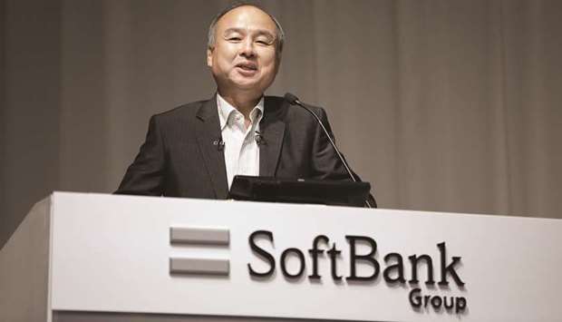 Masayoshi Son, chairman and chief executive officer of SoftBank Group Corp, reacts during a news conference in Tokyo. Son is struggling to raise money for a second massive technology investment fund in the wake of the failed public offering of office-rental company WeWork and sliding valuations of other major investments, according to two people familiar with the situation.