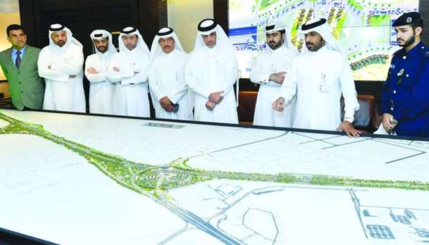 Dignitaries and officials being briefed on the new Tilted Interchange. PICTURE: Ram Chandrnrn