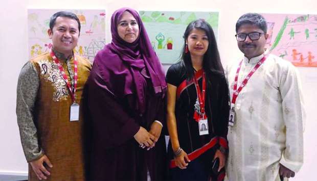 (From left) Aladin Borja with WISH CEO Sultana Afdhal and other Save the Children team members at the recently held u2018Artistic Dimensions to a Healthier Worldu2019 exhibition.