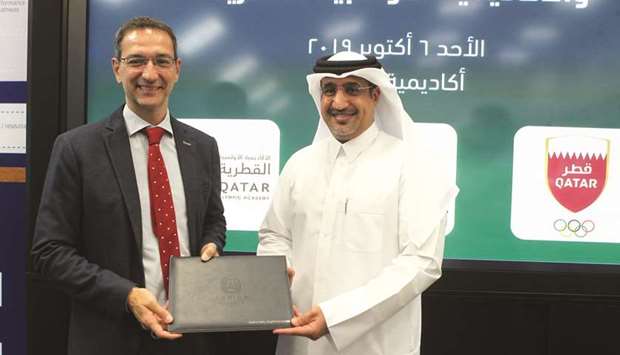 Aspire Academy Director General Ivan Bravo (left) and Qatar Olympic Academy Executive Director Saif Mohammed al-Nuaimi after signing the agreement.