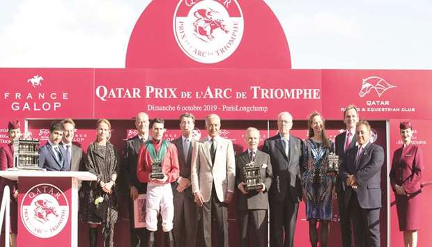 His Highness Sheikh Abdullah bin Khalifa al-Thani (centre) crowned the connections of Waldgeist, which won the Gr 1 Qatar Prix de lu2019Arc de Triomphe, yesterday.