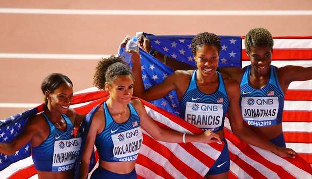 Phyllis Francis, Sydney Mclaughlin, Dalilah Muhammad and Wadeline Jonathas of the US celebrate after the Women's 4 X 400 Metres Relay Final at the Khalifa International Stadium, Doha.  PICTURE: Jayan Orma