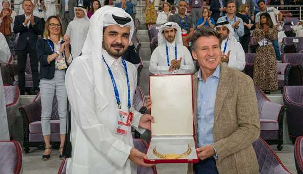 Sheikh Joaan bin Hamad al-Thani receiving the order of merit from President of the International Association of Athletics Federations Lord Sebastian Coe