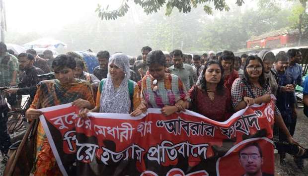 Hundreds of students staged protests in Bangladesh universities after a pupil was allegedly beaten to death by activists of the ruling party hours after he criticised Prime Minister Sheikh Hasina's water sharing deal with India.
