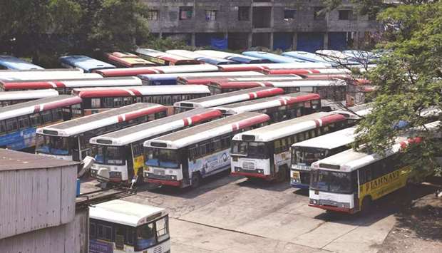 Buses remain parked in a depot during a transport strike in Hyderabad.