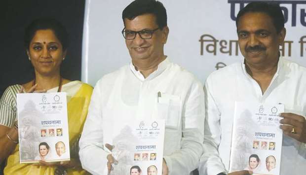 Nationalist Congress Party leader Supriya Sule, Maharashtra Congress president Balasaheb Thorat and NCP Maharashtra president Jayant Patil launch their joint election manifesto in Mumbai yesterday.