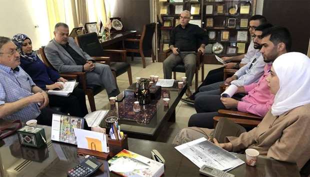 Officials attend the signing ceremony.rnrn