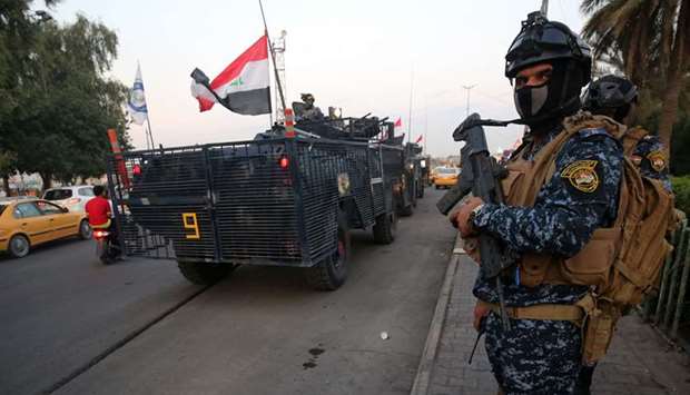 Iraqi police are seen deployed in Baghdadu2019s Sadr City, yesterday.