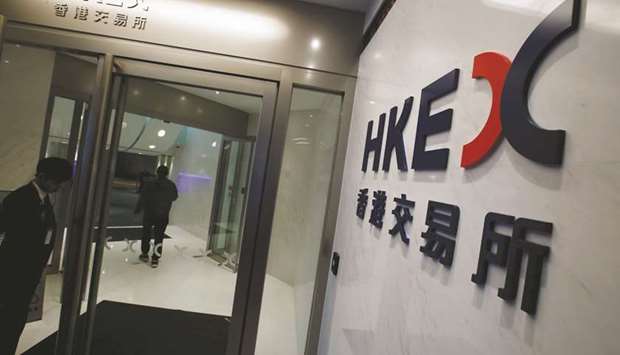 The Hong Kong Exchanges and Clearing logo is displayed at its entrance in Hong Kong, China. The HKEX abruptly dropped its $36.2bn unsolicited takeover bid for London Stock Exchange Group after opposition from the UK company and a cool  reception from Beijing.