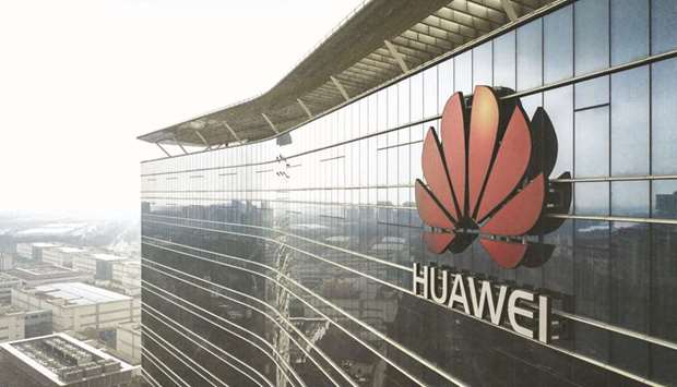 The Huawei logo is displayed atop an office building at the companyu2019s production facility in this aerial  photograph taken in Dongguan, China (file). Huawei has ambitions to build Brazilu2019s 5G network, a project that is scheduled to open for bids next year. For the past decade, China has been Brazilu2019s top trading  partner, largely due to its vast appetite for commodities. Total trade between the two countries reached $113bn in 2018.