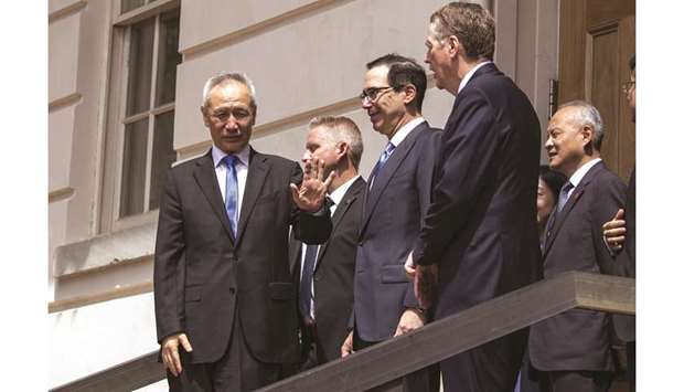 Liu He, Chinau2019s Vice Premier, waves while departing after a meeting with Robert Lighthizer, US Trade Representative, and Steven Mnuchin, US Treasury Secretary, in Washington (file). Beijing sharply rebuked Washington yesterday for adding some top Chinese artificial intelligence startups to its trade blacklist, dimming hopes for progress in high-level talks aimed at ending a 15-month trade war between the two economic giants.