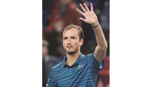 Daniil Medvedev of Russia waves to the crowd after defeating Cameron Norrie of Britain during their second round match at the Shanghai Masters in Shanghai yesterday. (AFP)