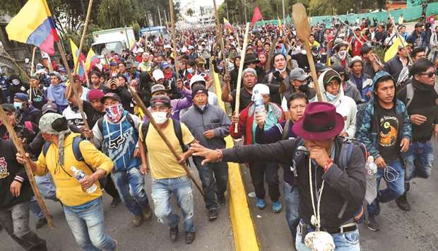 Demonstrators participate in a protest against President Lenin Morenou2019s austerity measures in Quito, Ecuador, yesterday.