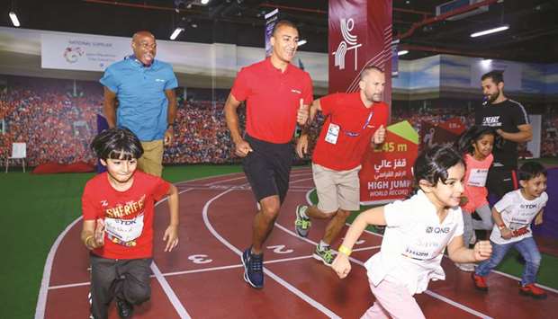 Famous athletics champions engaged with competing children at Doha Festival City.