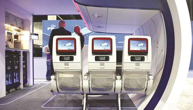 In-flight entertainment (IFE) screens are displayed on seats at the Airbus booth during the APEX Expo in Los Angeles on September 11. The advent of onboard Wi-Fi has given airlines the option of using your phone or tablet as a portal for films, television shows and video games, avoiding the expense of costly hardware at every seat.