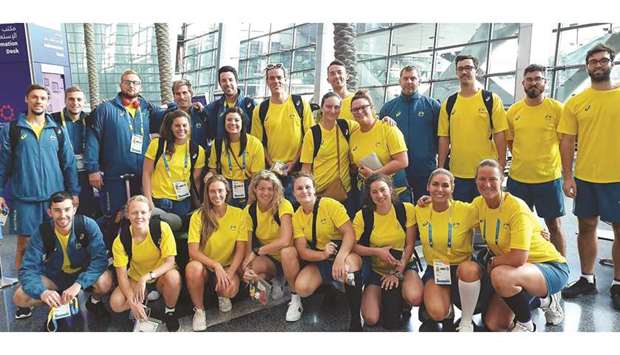 Australian athletes pose after their arrival in Doha yesterday, for the first ever ANOC World Beach Games.