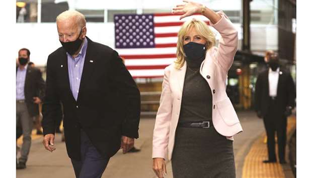 Democratic US presidential nominee Joe Biden and wife Dr Jill Biden arrive at a campaign stop at Pittsburgh Union Station in Pittsburgh, Pennsylvania, yesterday.
