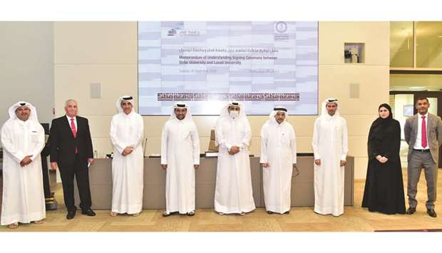 QU and Lusail University officials at the signing ceremony