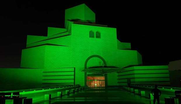 Museum of Islamic Arts lit in green to mark World Mental Health Day.