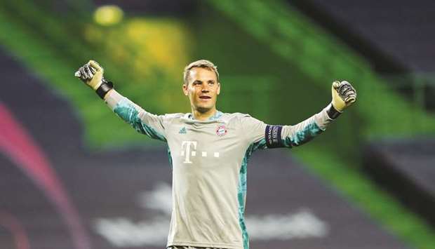 This file photo taken on August 19, 2020, shows Bayern Munichu2019s German goalkeeper Manuel Neuer celebrating his teamu2019s third goal during the UEFA Champions League semi-final against Lyon at the Jose Alvalade Stadium in Lisbon. (AFP)