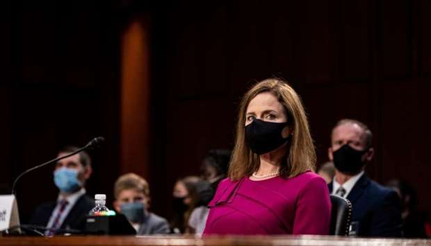 US Supreme Court nominee Amy Coney Barrett attends her confirmation hearing before the Senate Judiciary Committee on Capitol Hill in Washington, DC.