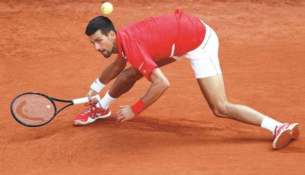 Serbiau2019s Novak Djokovic in action during his French Open second round match against Lithuaniau2019s Ricardas Berankis (not pictured) at Roland Garros in Paris, France, yesterday. (Reuters)