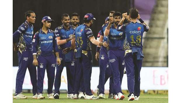 Mumbai Indians players celebrates the wicket of Mayank Agarwal of Kings XI Punjab during their Indian Premier League (IPL) match in Abu Dhabi yesterday. (Sportzpics for BCCI)