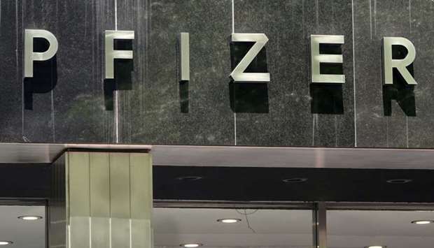 A Pfizer sign is pictured at their Headquarters in the Manhattan borough of New York City, New York, US on July 22. Pfizer said that it may say if the vaccine is effective as soon as this month based on its 40,000 person clinical trial but that it also needs safety data that will not be available until next month