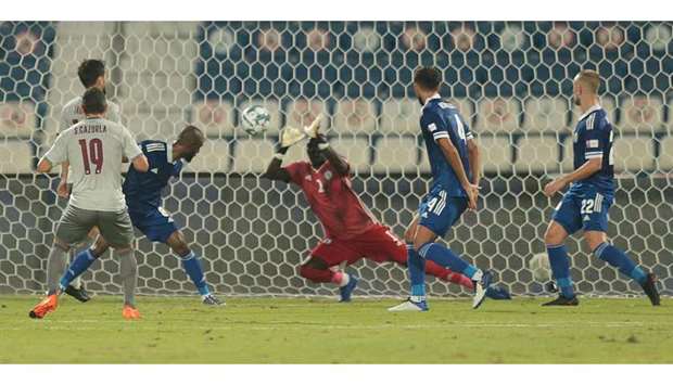 Al Khoru2019s goalkeeper Baba Djibril (centre) makes a save during the QNB Stars League match against Al Sadd yesterday.