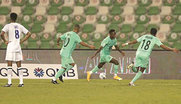 Al Ahliu2019s Abdulrasheed Umaru (centre) celebrates after scoring against Al Sailiya in the QNB Stars League yesterday.