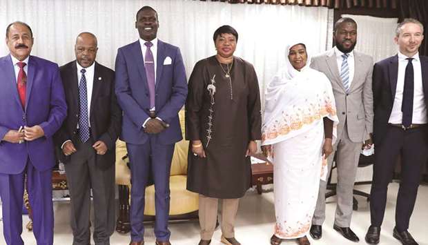Prosecutor of the International Criminal Court, Fatou Bensouda (centre), poses with Sudanese officials during her visit to the ministry of justice in Khartoum, yesterday.