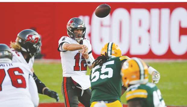 Tampa Bay Buccaneers' quarterback Tom Brady (centre) throws a pass during the NFL game against Green Bay Packers in Tampa, Florida. (USA TODAY Sports)