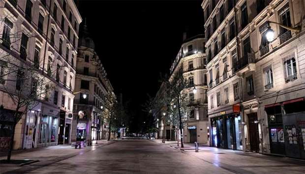 A deserted Republique street in Lyon, as a curfew is in place to fight the spread of Covid-19. About 20 million people in the Paris region and eight other French cities were facing a 9 pm-6 am curfew.