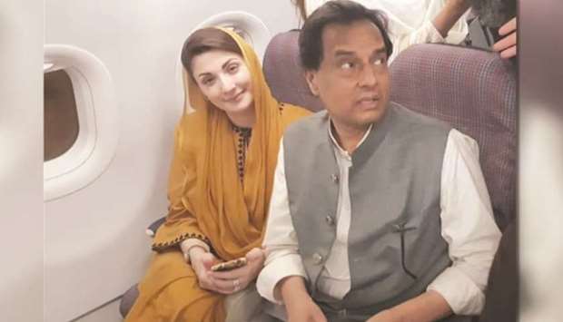 Maryam Nawaz (left) with her husband Captain (retired) Safdar on the return flight to Lahore from Karachi yesterday after the latteru2019s release.
