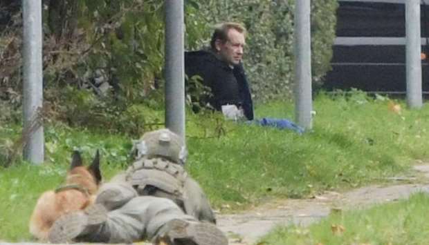 Peter Madsen is seen surrounded by police in Albertslund, Denmark. Ritzau Scanpix/Nils Meilvang via REUTERS