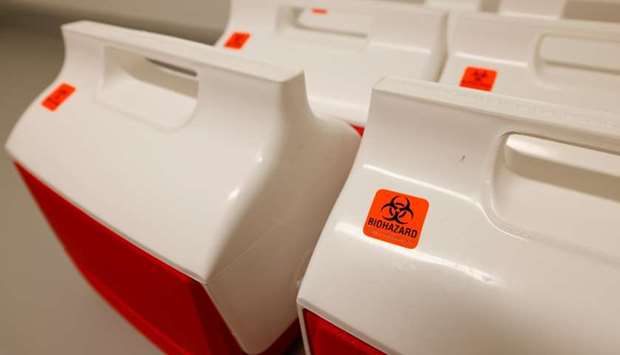 Coolers with bio hazard stickers are shown inside a trailer compound after a Phase 3 trial location of Johnson & Johnson's Janssen vaccine candidate was announced in National City during the outbreak of the coronavirus disease in National City, California, on  October 13