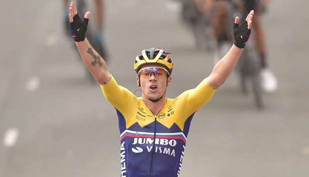 Team Jumbo rider Sloveniau2019s Primoz Roglic celebrates winning the 1st stage of the 2020 La Vuelta cycling tour of Spain, a 173 km race from Irun to Arrate yesterday.