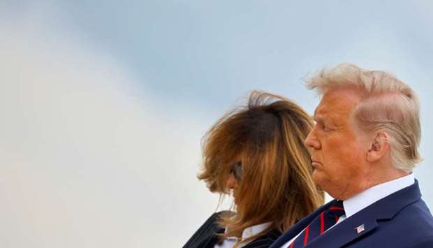 US President Donald Trump and first lady Melania Trump as they arrive at Cleveland Hopkins International Airport to participate in the first presidential debate with Democratic presidential nominee Joe Biden in Cleveland, Ohio, US, September 29